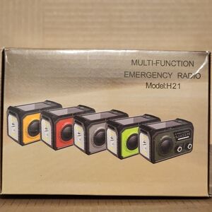 New In Box. Multi-Function Emergency Radio - Black and Silver